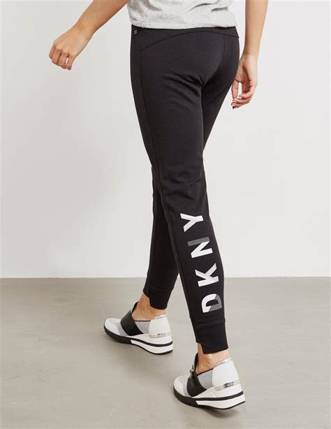 Contact information for aktienfakten.de - These classic joggers are cut for optimal comfort and designed to move with your body from lunges to lounging and everything in-between. High-rise Pull-on Drawstring at waistband DKNY logo along side Tapered leg Rib-knit hem Model wears size S 60% Cotton, 40% Polyester Origin: Imported Style: DP2P1251 